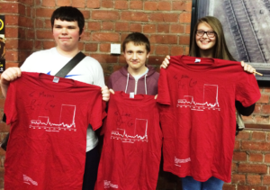 students-with-signed-t-shirts