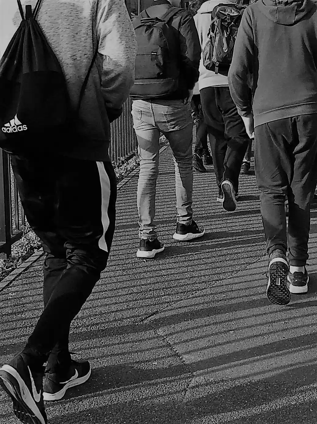 Close up of young people's legs walking