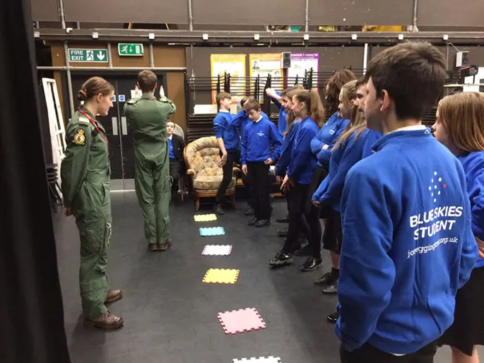 A group of JET blue skies students with staff members